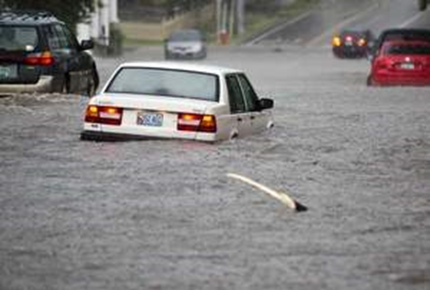 Flooding at the intersection of Main St. and South Winooski Ave. on 4 4 July 2012 after an intense thunderstorm swept through the city of Burlington